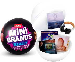 Zuru Mini Brands Really Works Vinyl capsule opened to show mini records and headphones