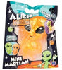Orange glitter Mini Martian squeeze toy in Alien Invasion space-themed polybag packaging