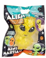 Yellow glitter Mini Martian squeeze toy in Alien Invasion space-themed polybag packaging