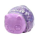 Purple Aphmau MeeMeow mystery squishy dragon figure inside its sealed blind box capsule