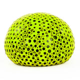 Neon yellow Beadz Alive giant squeeze ball showing bumpy texture close up