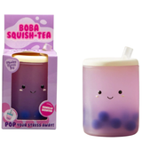 Kawaii vanilla scented boba tea squishy stress toy next to its purple Boba Squish-Tea gift box