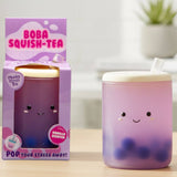 Kawaii vanilla scented boba tea squishy stress toy next to its purple Boba Squish-Tea gift box