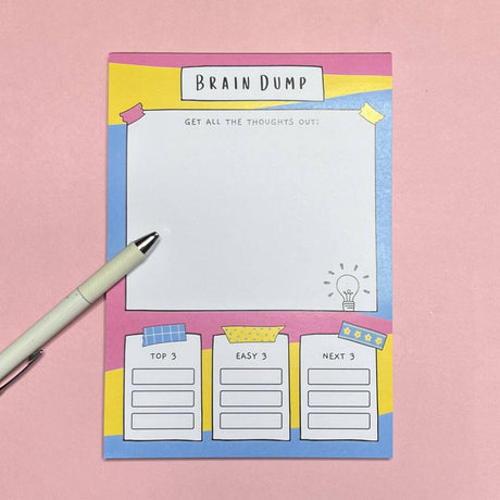 Brain dump notepad flat lay, colourful anxiety and ADHD-friendly planning stationery