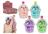 Four bubble tea bead squish toys in pink · blue · purple and green with display box