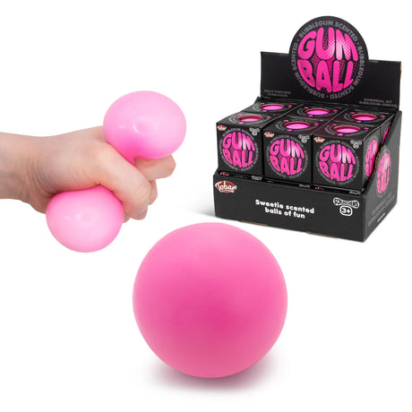 Pink bubblegum squish ball being squeezed alongside product display box and loose ball
