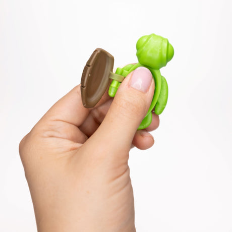Green Calm Buddi Turtle shell open in hand, sensory fidget anxiety toy