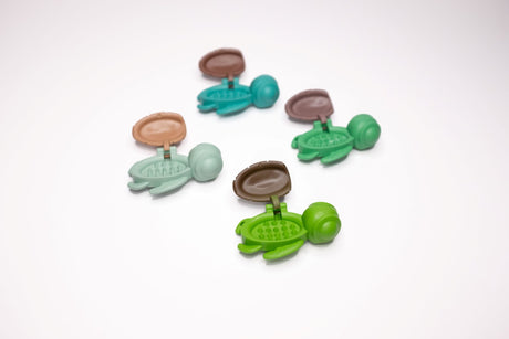 Four Calm Buddi Turtles with shells open, green and teal Nature colourway