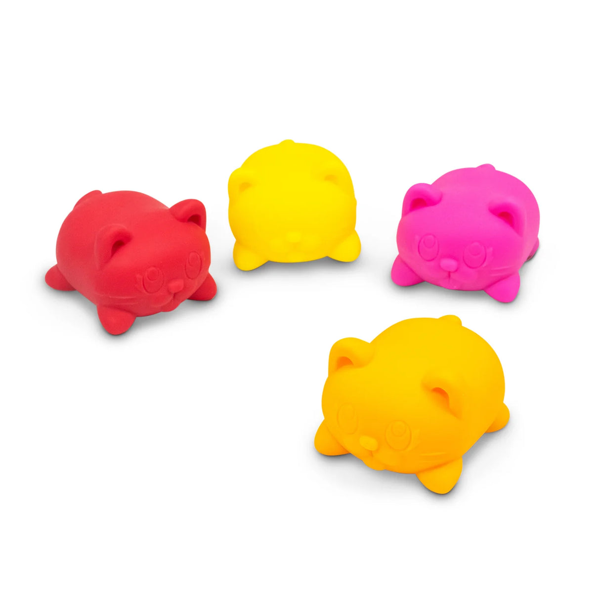 Four Candy Cats scented squishy stress toys in red, orange, yellow, and pink arranged together