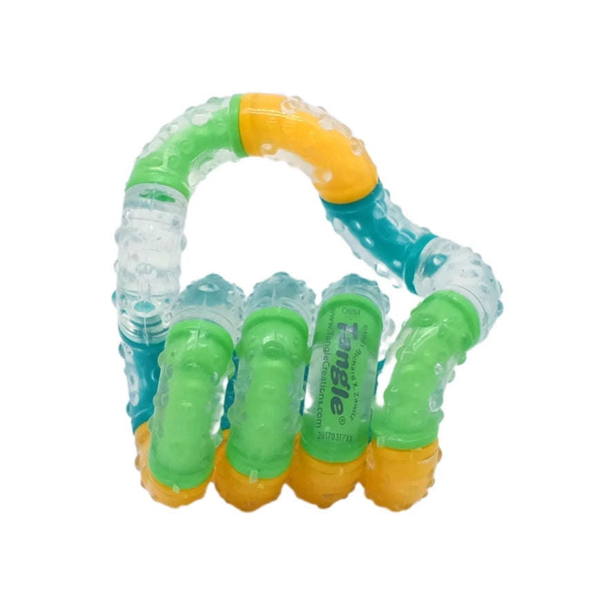 Colorful textured toy with green, yellow, and blue sections on a white background