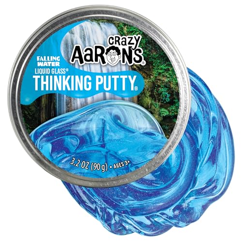 Crazy Aaron's Falling Water Liquid Glass Thinking Putty tin beside its blue glossy swirl
