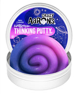 Crazy Aaron's InterGalactic Triple Change Thinking Putty open tin showing glittery blue, purple and pink colour-shifting putty with space-themed lid artwork