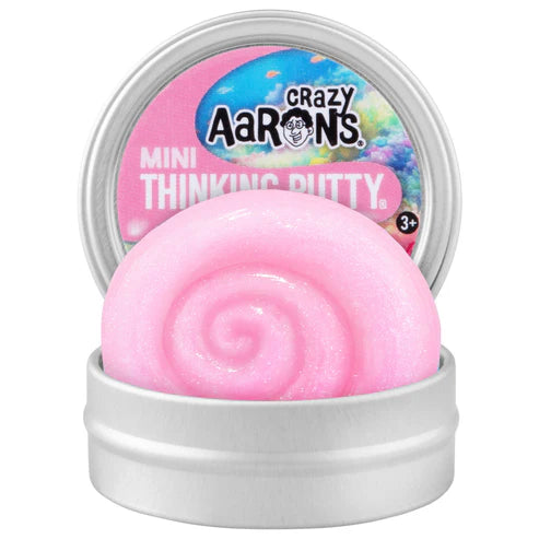 Pink thinking putty in a container with 'Crazy Aaron's' branding on a white background