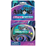 Crazy Aaron's Super Scarab Thinking Putty in its retail packaging, featuring a purple and blue color-shifting putty container with a cartoon logo on a white background.