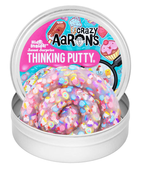 Crazy Aaron's Sweet Surprise Hide Inside Thinking Putty open tin showing pearlescent pink putty filled with miniature candy and sweet confetti pieces