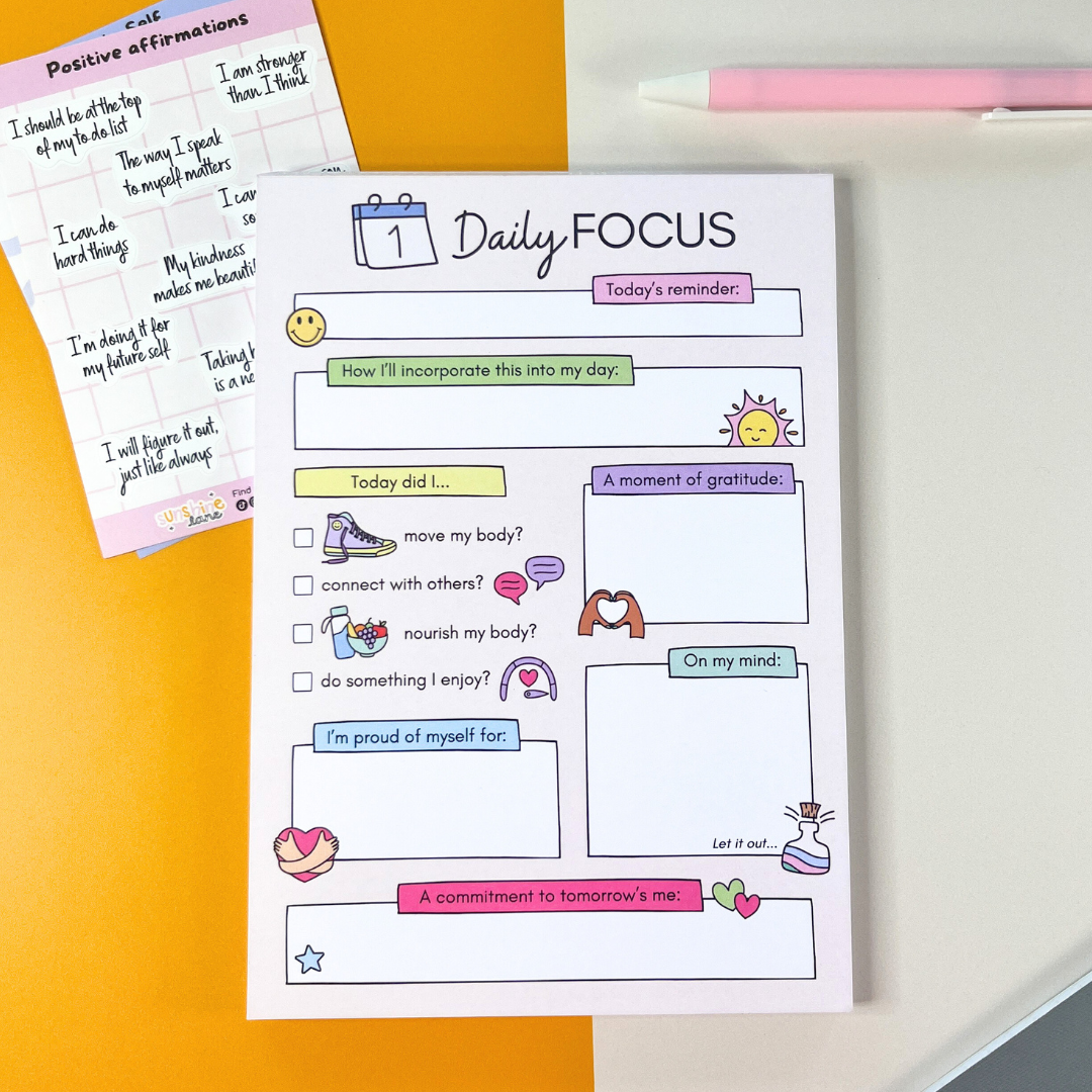 Daily Focus self-care notepad with pastel prompts, mental wellness stationery