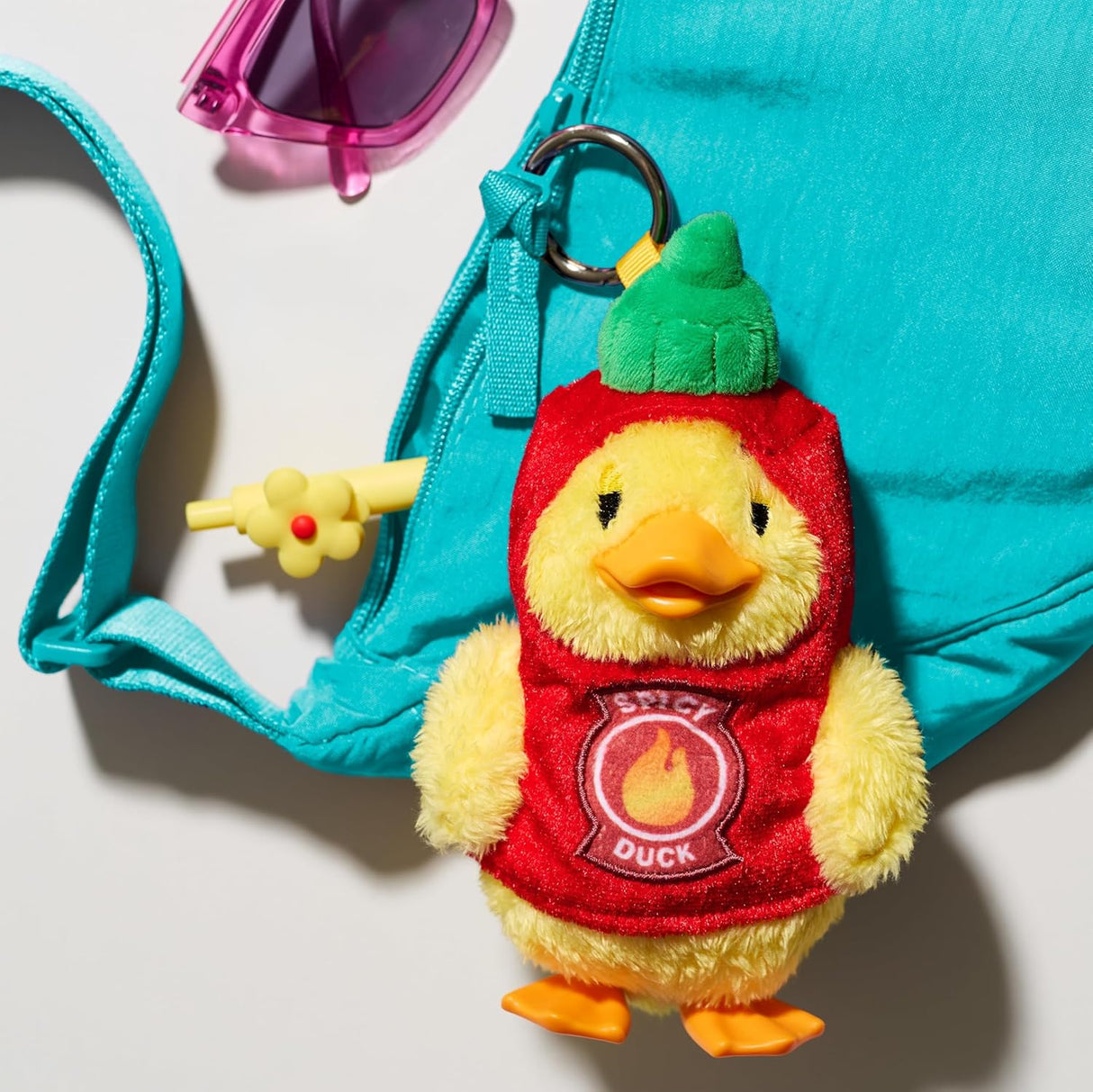 Duckalooz Spicy Duck plush clip-on keychain in red pepper costume, collectible sensory plush