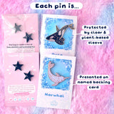 Evy Benita Arctic Nova Orca enamel pin showing eco packaging and backing card details