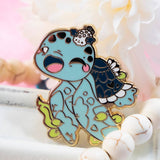 Evy Benita Leatherback Sea Turtle enamel pin close-up with pink flowers, gold plating