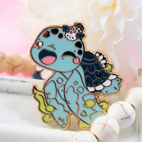 Evy Benita Leatherback Sea Turtle enamel pin close-up with pink flowers, gold plating