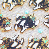 Evy Benita Oceanic Manta Ray enamel pins displayed on burlap, multiple pins