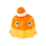 Orange jelly pudding fidget toy topped with a whipped cream swirl and smiling face