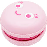Pink kawaii macaron fidget toy with a winking smiling face design
