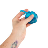 Blue Flower Power squishy keyring being squeezed in a hand to demonstrate texture