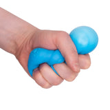 Hand squeezing a neon blue squish bear, showing the squishy material deforming