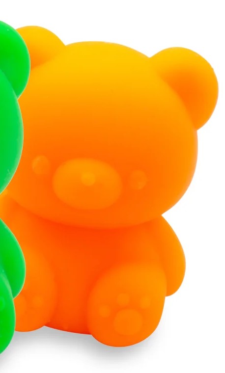 Close-up texture detail of a neon orange fruity squish bear