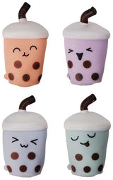 All four Giggletastic Bubble Tea Buddy squishy toys out of packaging showing peach, lilac, green and blue-mint variants