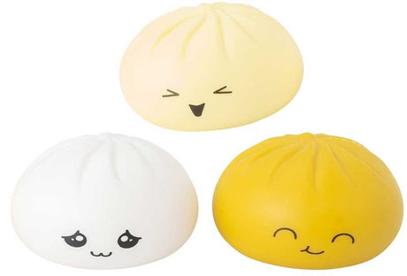 All three Giggletastic Mystery Bao Buddy kawaii squishy characters in cream white and golden yellow with cute expressions