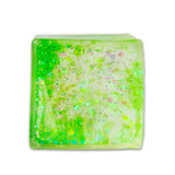 Green glitter sugar cube from above showing neon green gel and multicoloured glitter