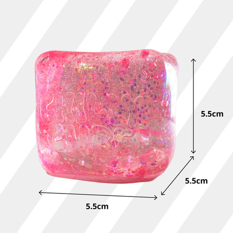 Pink glittery square object with dimensions labeled on a white background