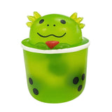 Green axolotl boba tea squish toy with spiky head and bubble tea cup body