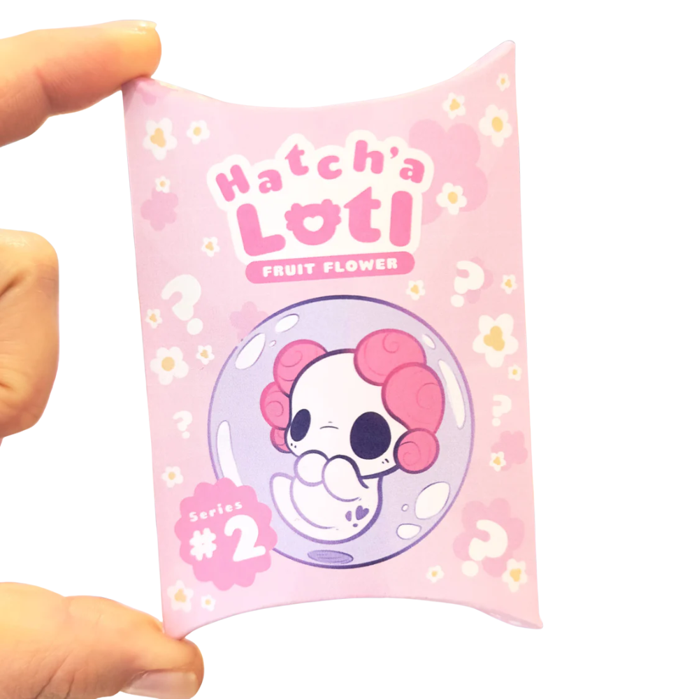 Hatch'a Lotl Fruit Flower Series 2 axolotl blind bag collectible, pink, white background