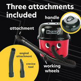 Henry Hoover mini desk vacuum red black showing three attachments and working wheels