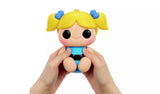 Hands squeezing Hyojo Bubbles squishy collectible with blonde pigtails and blue striped outfit