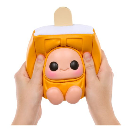 Hyojo Creamsicle orange collectible plush squeezed in two hands
