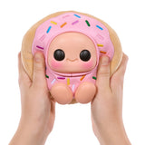 Hyojo Krispy Kreme strawberry iced doughnut plush held in hand, sensory fidget toy