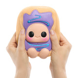 Hands squeezing Hyojo Pop-Tarts Wild Berry squishy plush with purple icing and blue drizzle