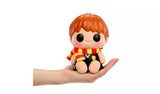 Hyojo Ron squishy collectible figure sitting in hand, showing size and soft plush scarf