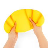 Two hands holding Jumbo Squishy Croissant showing oversized size and soft slow-rise stretchy sensory fidget toy