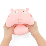 Two hands squeezing Jumbo Squishy Pig showing oversized size and soft slow-rise sensory stress relief fidget toy