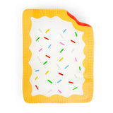 Flat lay of a jumbo golden yellow squishy Pop-Tart with white icing drizzle and colourful sprinkles 