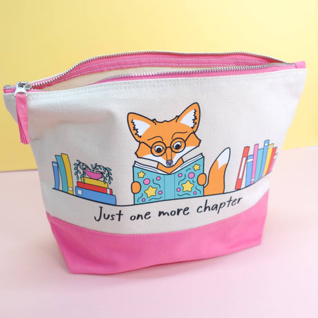 Just One More Chapter fox canvas pouch displayed flat-on against a yellow background showing full cream and pink two-tone design