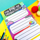 Katie Abey Pad of Productivity rainbow notepad, close-up top half, pencils and pompoms