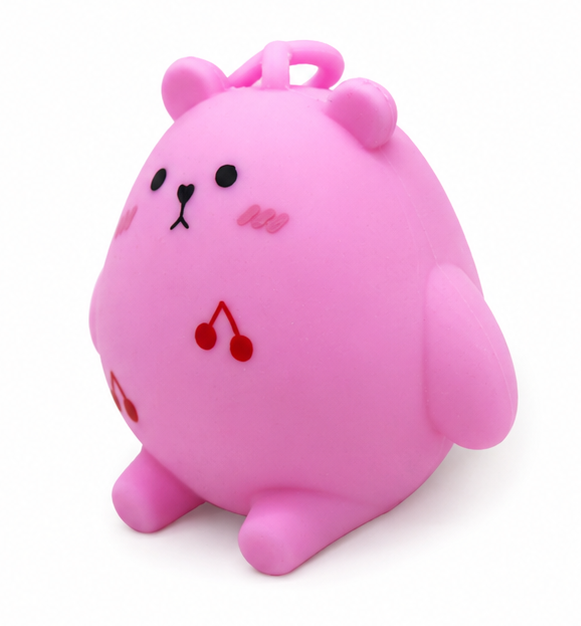 Pink kawaii bear squishy toy with cherry detail, sensory fidget toy