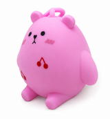 Pink kawaii bear squishy toy with cherry detail, sensory fidget toy