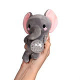 Kawaii elephant gel bead belly squeeze plush toy being held in a hand with the clear gel bead belly pushed out, showing the grey body with pink inner ears